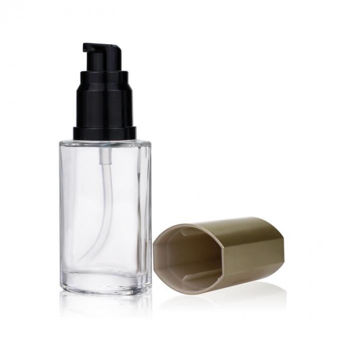 Botella de empaquetado cosmética de lujo de la fundación de la botella de vidrio 40ML con la bomba del oro para el maquillaje